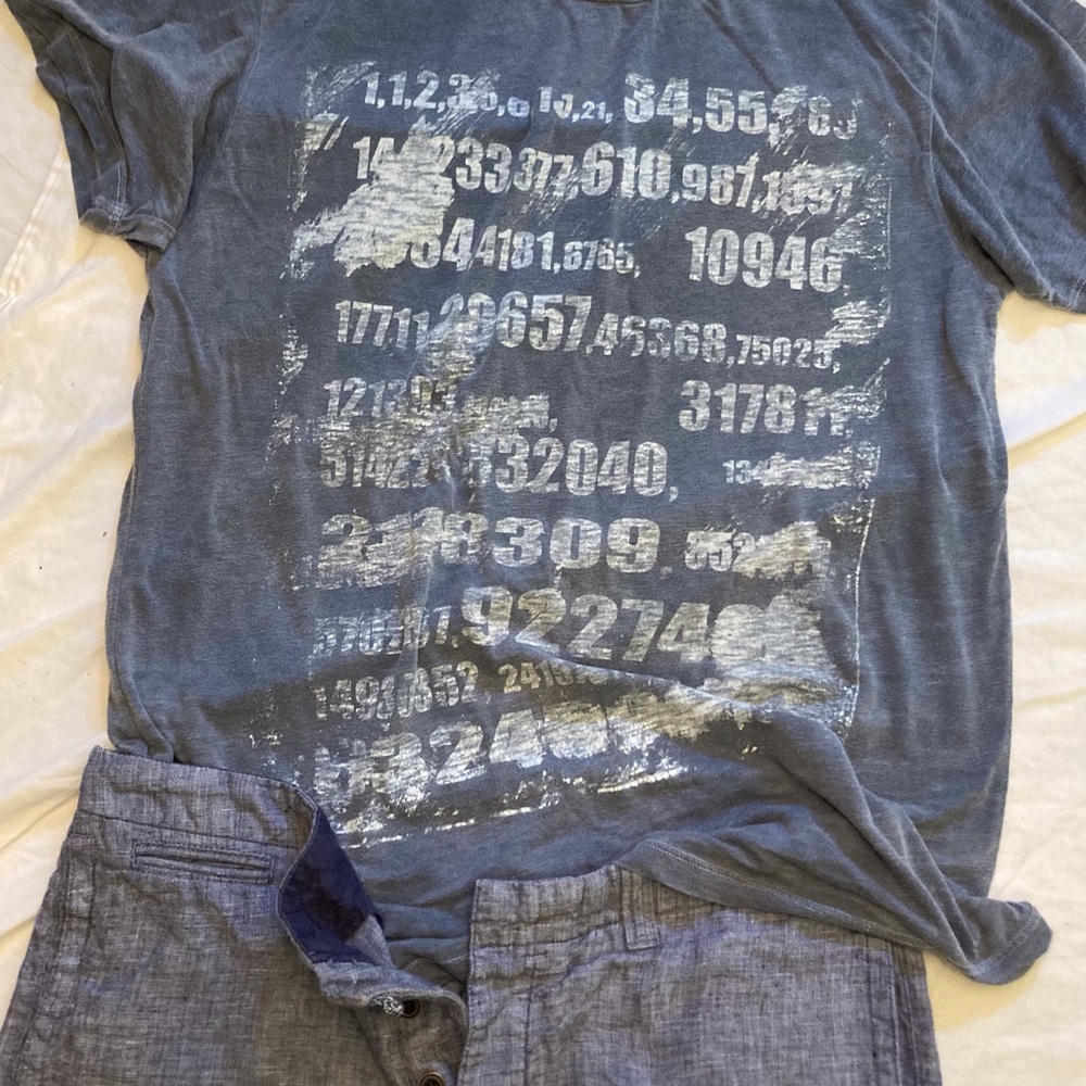 Wet Cement cotton Tee unisex binary codes in chalk white on washed indigo blue